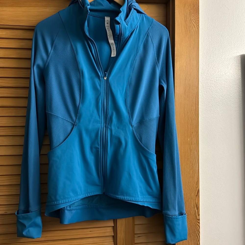 Lululemon Blue jacket.  10.  Zip in hood.  NWOT